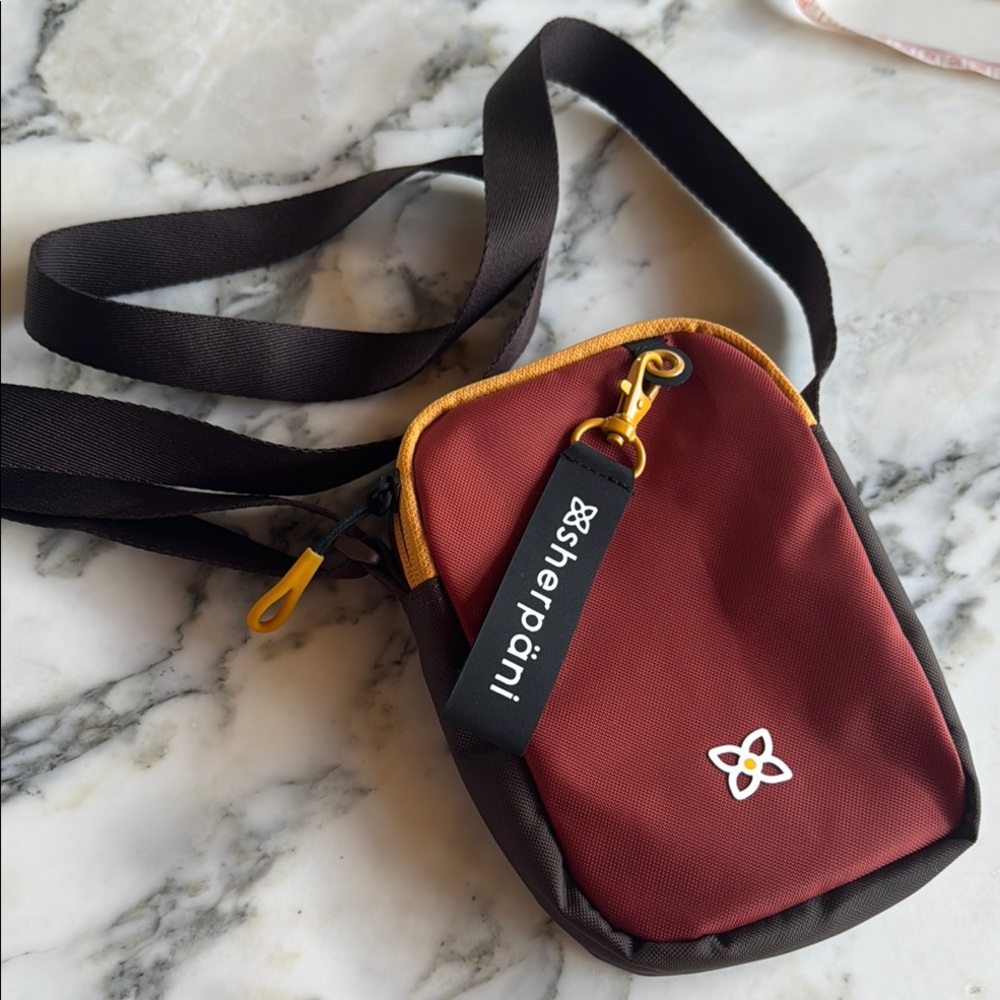 Sherpani Rogue Burgundy & Brown Crossbody Unisex Bag NWOT